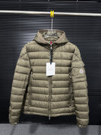 Olive hooded puffer jacket with full front zipper and side logo patch