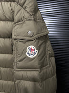 Olive puffer jacket with embroidered logo patch on chest pocket
