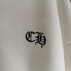 White hoodie with black embroidered C-style logo