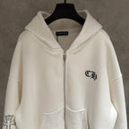 White zip-up hoodie with hood, zip front, and small chest emblem
