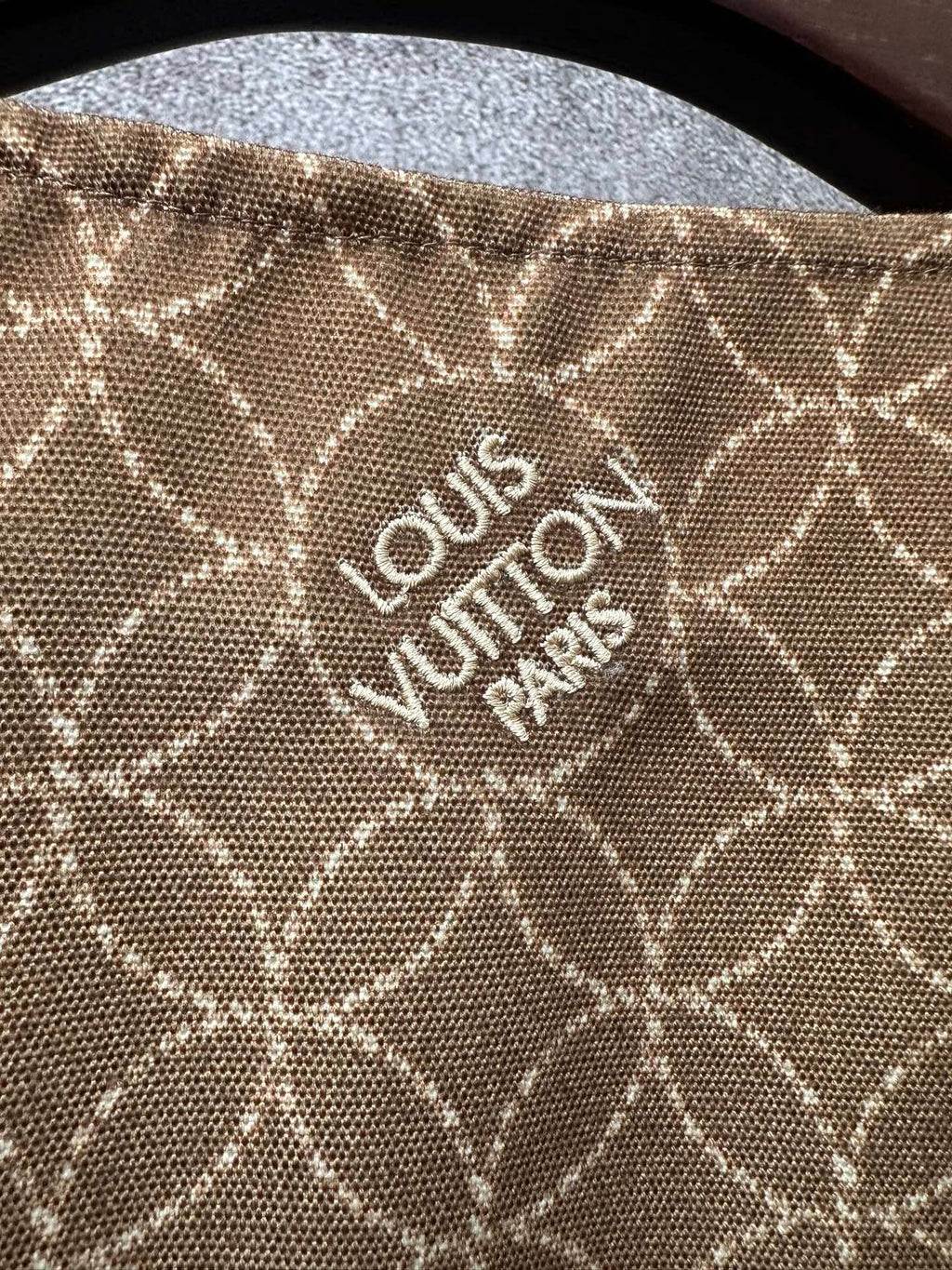 Long Louis Vuitton coat fabric with monogram pattern