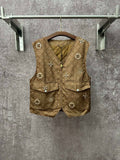 Gold monogram sleeveless vest with zip front, flap pockets, decorative charm buttons