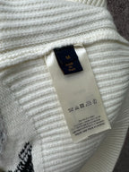 Louis Vuitton knit sweater neckline and care label tag, ribbed light knit