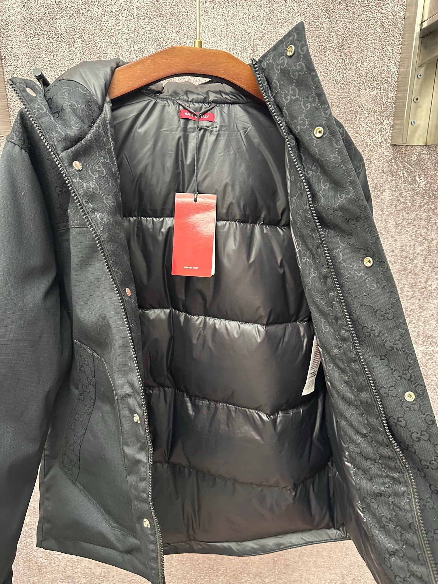 Gucci long puffer jacket with dark gray hood and logo-trim details, open front