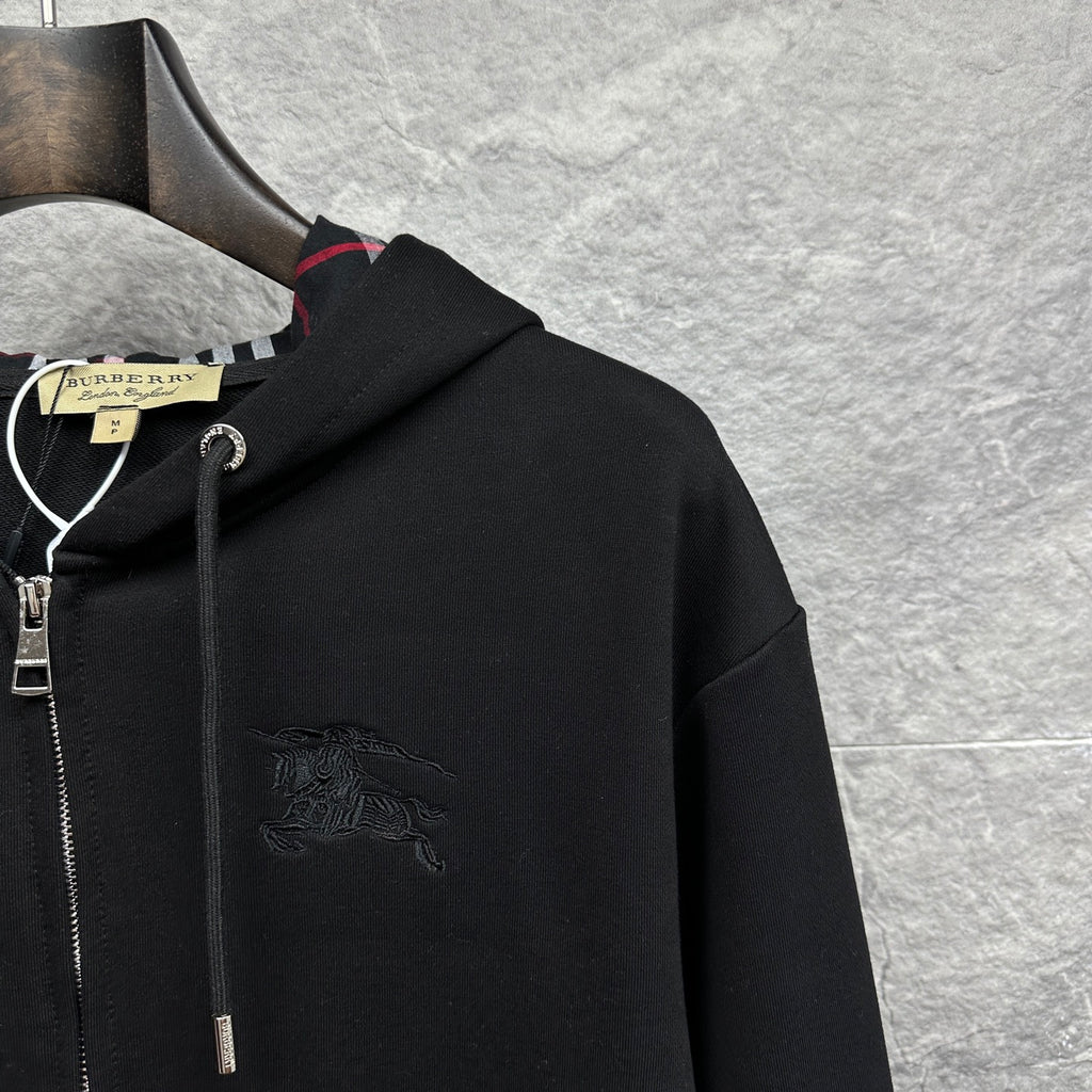 Burberry zip-up hoodie, black, chest area with embossed horse logo and hood details