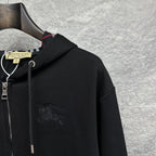 Burberry zip-up hoodie, black, chest area with embossed horse logo and hood details