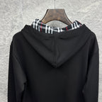 Burberry zip-up hoodie, black, back view with hood and plaid-lined trim
