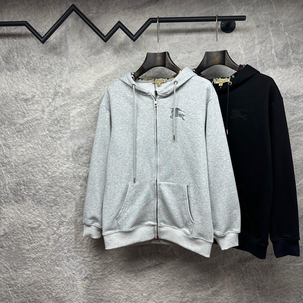 Burberry zip-up hoodies, light gray and black, both with front zippers and hoods