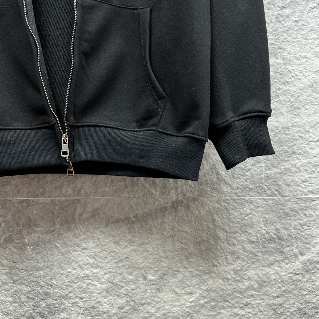 Burberry zip-up hoodie, black, close-up of kangaroo pocket and zipper hardware