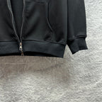 Burberry zip-up hoodie, black, close-up of kangaroo pocket and zipper hardware