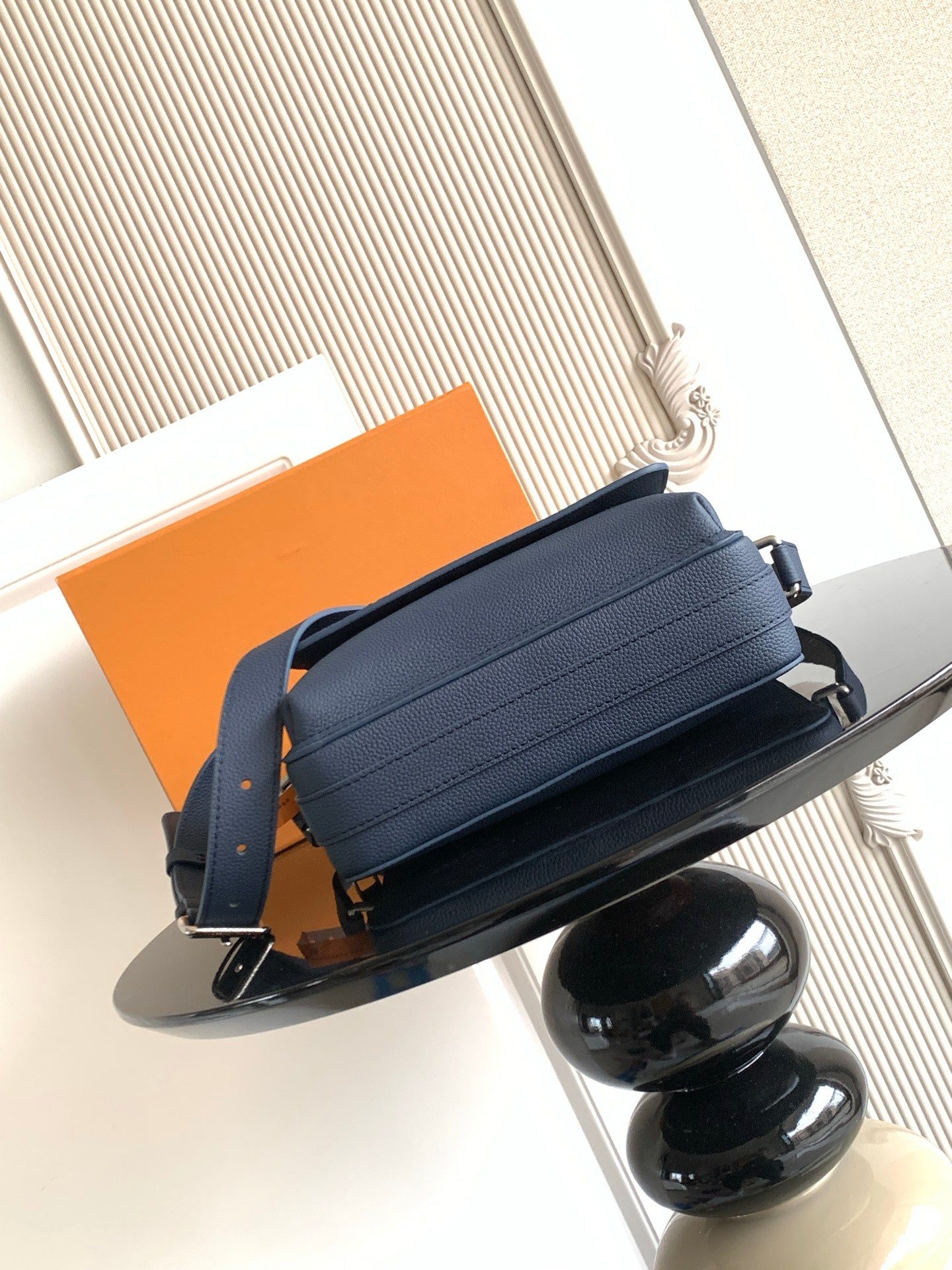 Men's Louis Vuitton blue zippered crossbody bag with long strap and front quilting