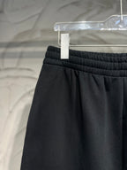 Balenciaga dark black pants waist with ribbed elastic waistband and pleated front