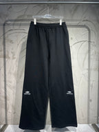 Balenciaga wide-leg pants in dark black with elastic waistband and relaxed fit