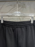 Balenciaga dark black pants with elastic waistband and gathered stretch detail