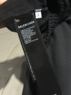 Balenciaga pants care label on inner waistband with fabric composition text