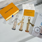 Louis Vuitton mini bag charm keychain with silver padlock clasp and chain