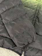 Gray puffer jacket panel with allover GG logo texture and front seam