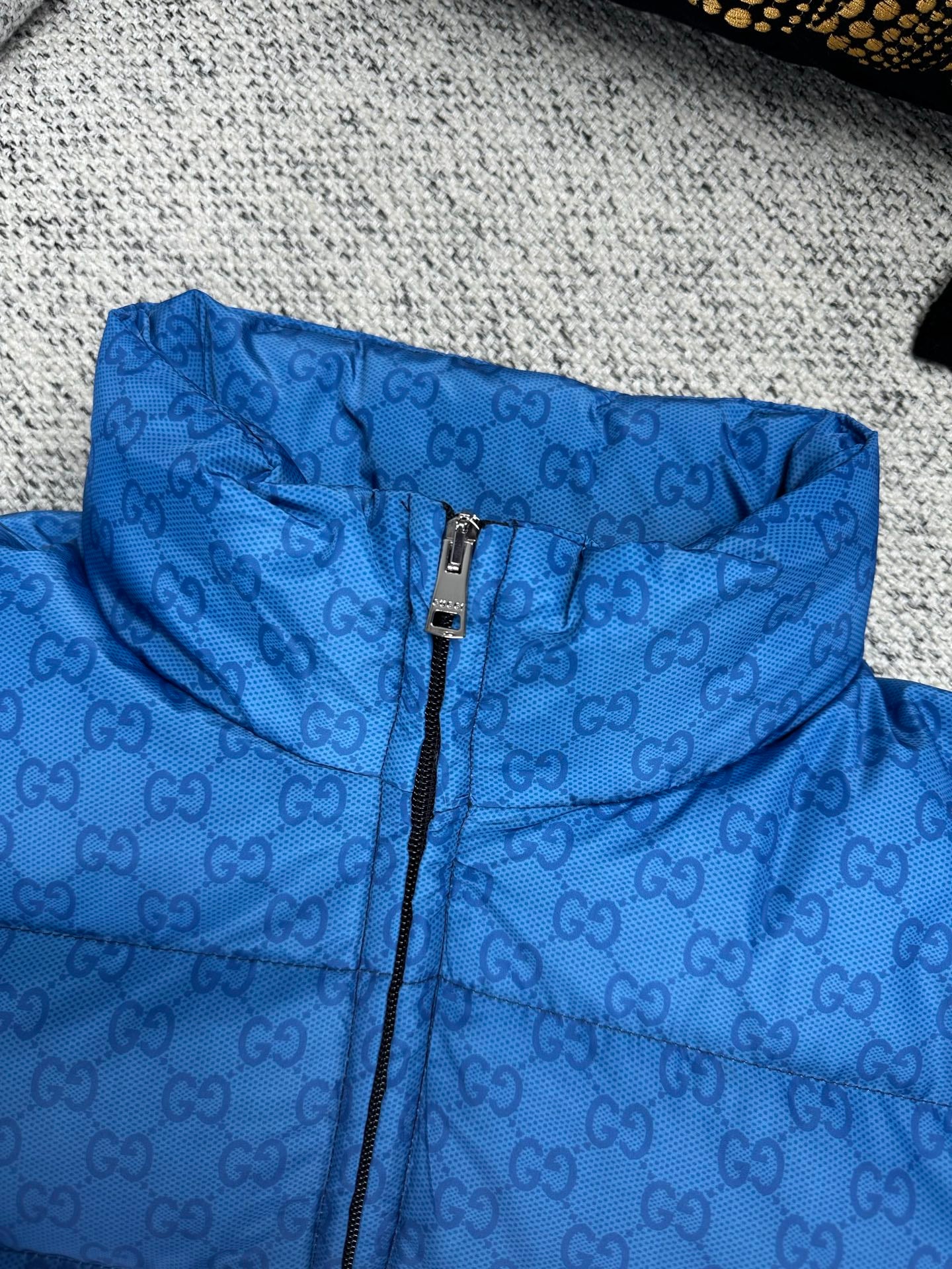 Gucci blue GG-pattern puffer jacket, hooded neckline with center zipper