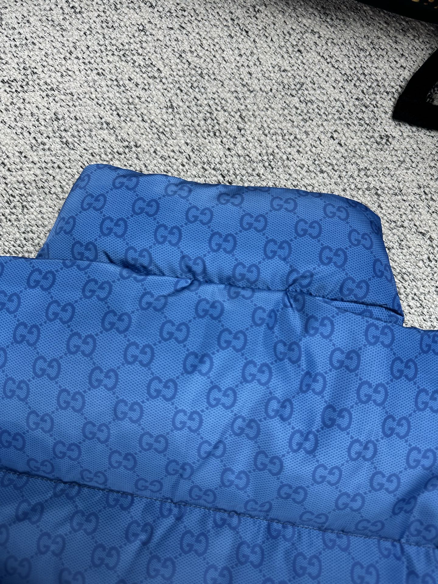 Gucci blue GG-pattern puffer jacket, hood area with stitched quilting