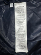 Gucci puffer jacket size and care label tag on inner seam