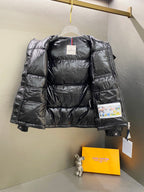 Moncler long padded jacket with hood, dark quilting and front pockets