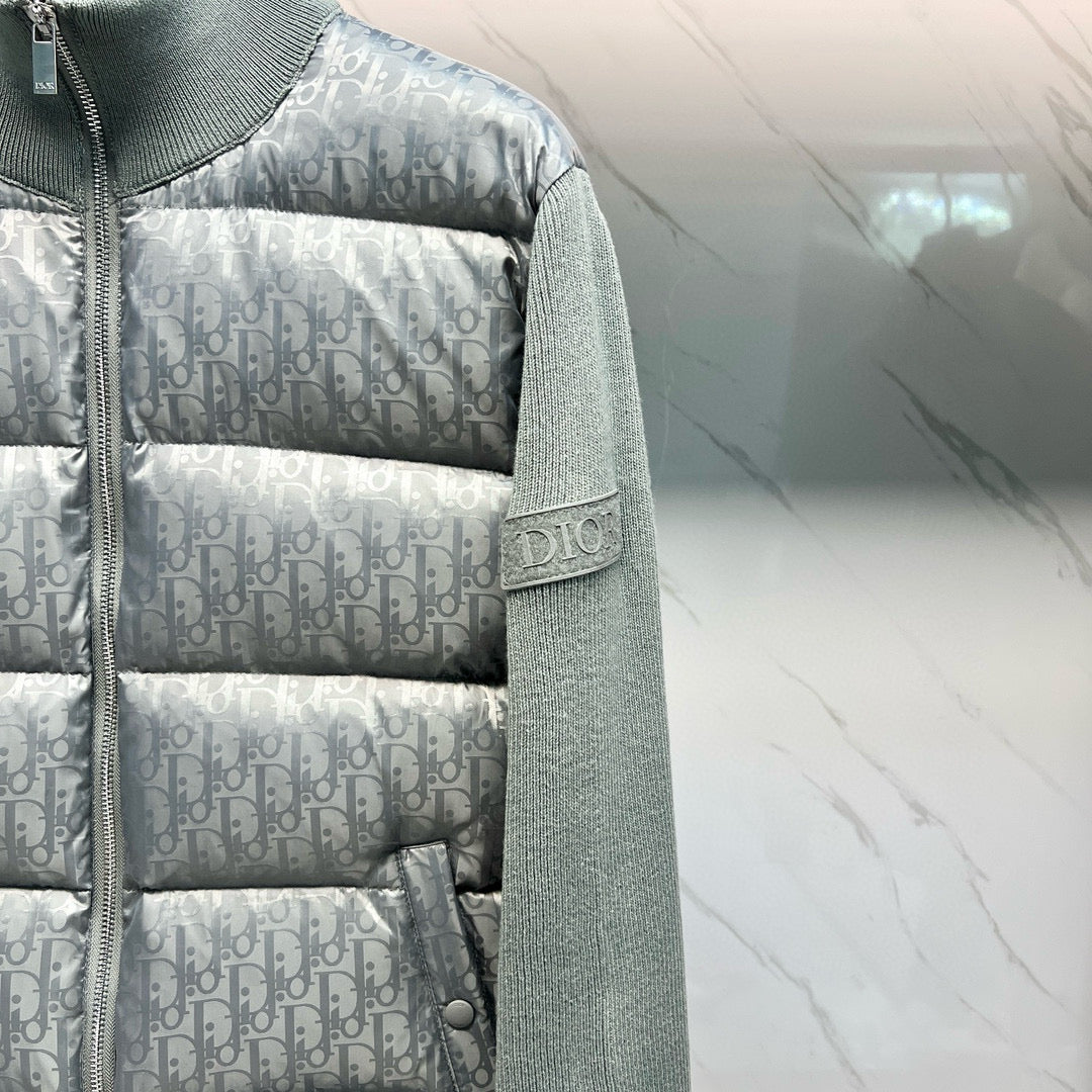 Dior light gray logo puffer jacket sleeve with embroidered logo patch
