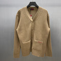 Beige ribbed knit cardigan sweater with button front and V-neck