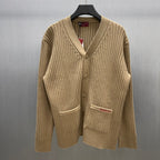 Beige ribbed knit cardigan sweater with button front and V-neck