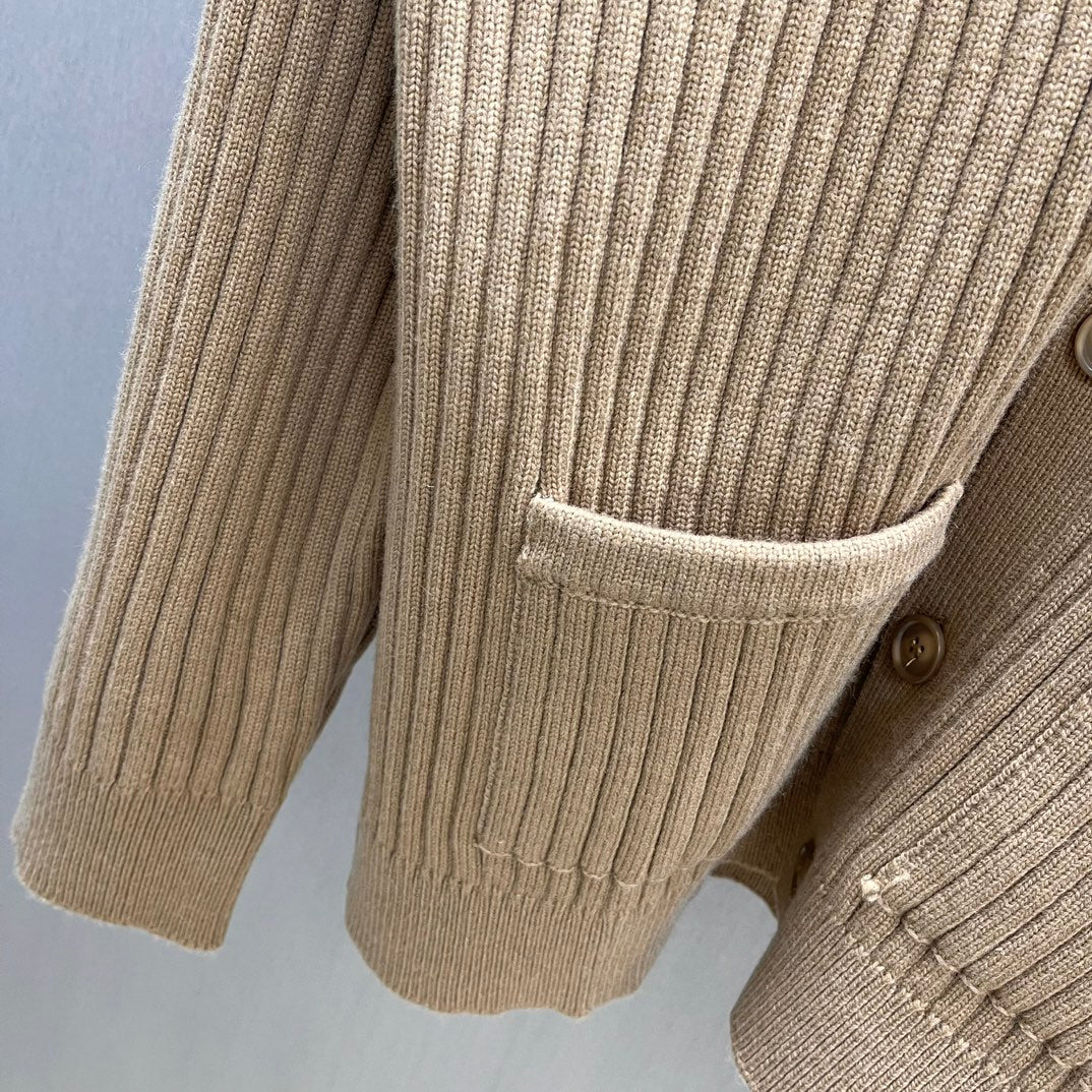 Beige ribbed knit cardigan with patch pocket and button