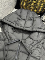 Moncler long puffer coat hood with center zip and stitched quilting