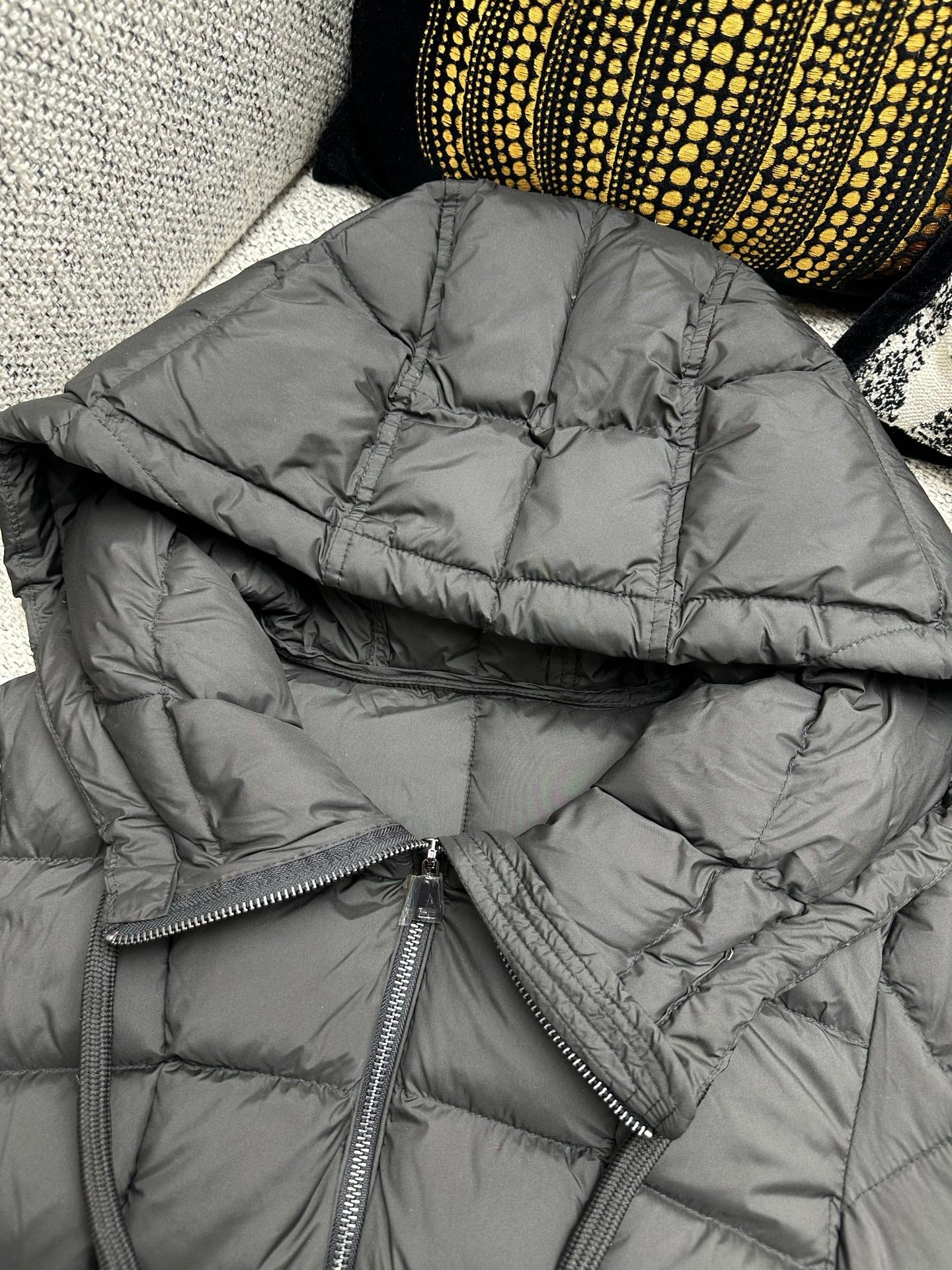 Moncler long puffer coat hood with center zip and stitched quilting