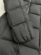 Moncler long puffer coat sleeve with zip pocket and quilted padding