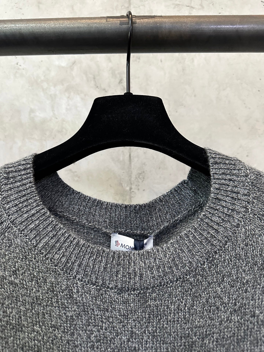 Gray heather knit crew neckline with small interior neck label