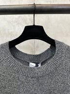 Gray heather knit crew neckline with small interior neck label