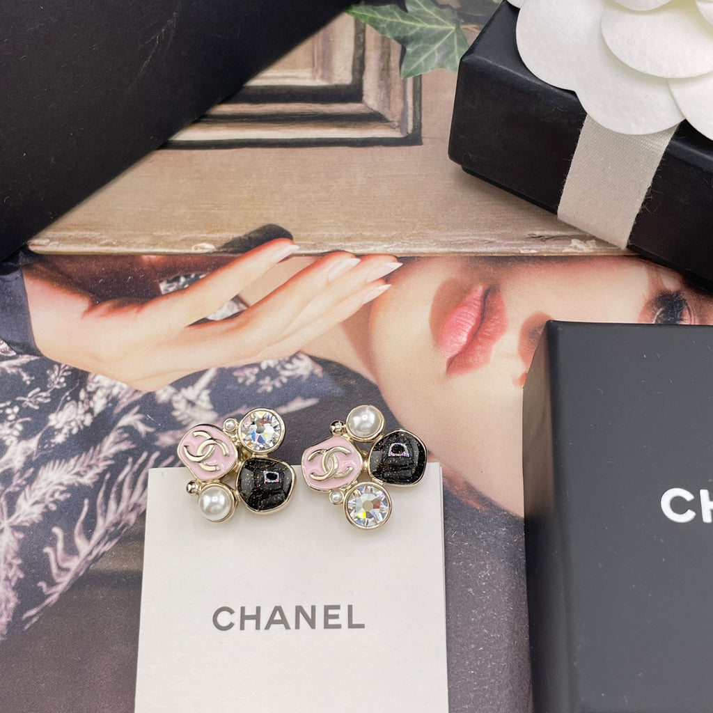 Chanel-style charm earrings on white card, faux pearls and black glitter stones