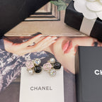 Chanel-style charm earrings on white card, faux pearls and black glitter stones