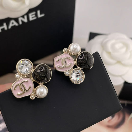 Chanel-style charm earrings, pink enamel and faux pearls with clear rhinestone details