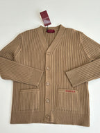 Tan ribbed knit cardigan with V-neck, button front, and Gucci logo patch
