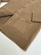 Tan ribbed knit cardigan with button front and Gucci logo patch