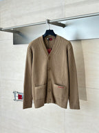 Tan ribbed knit cardigan with button front and patch pocket detail
