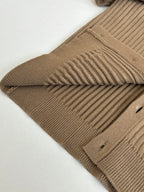 Tan ribbed knit cardigan with folded shoulder and ribbed sleeve cuff detail