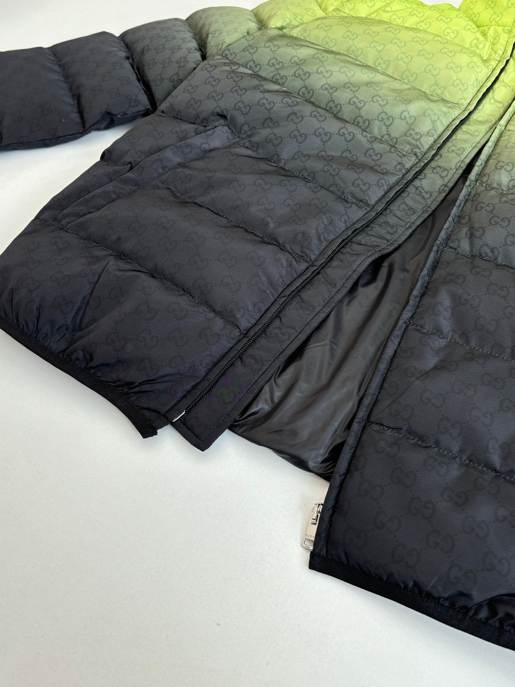 Folded dark monogram puffer jacket with zipper and quilted padding