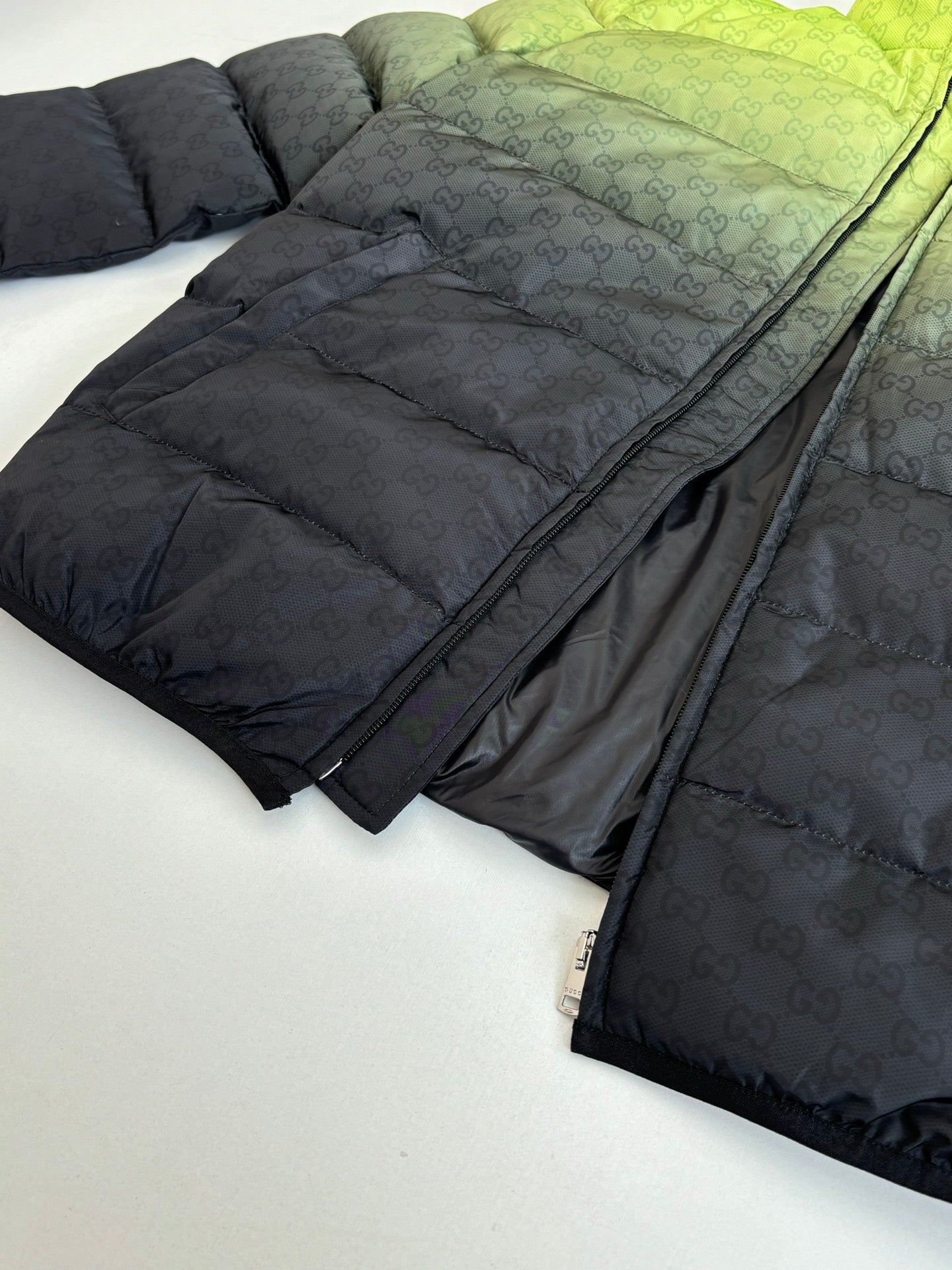 Folded dark monogram puffer jacket with zipper and quilted padding