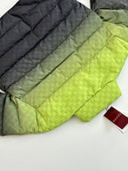 Folded puffer jacket set: lime green top layer and dark layer with monogram