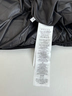Gucci long puffer jacket with white care label and brand tag