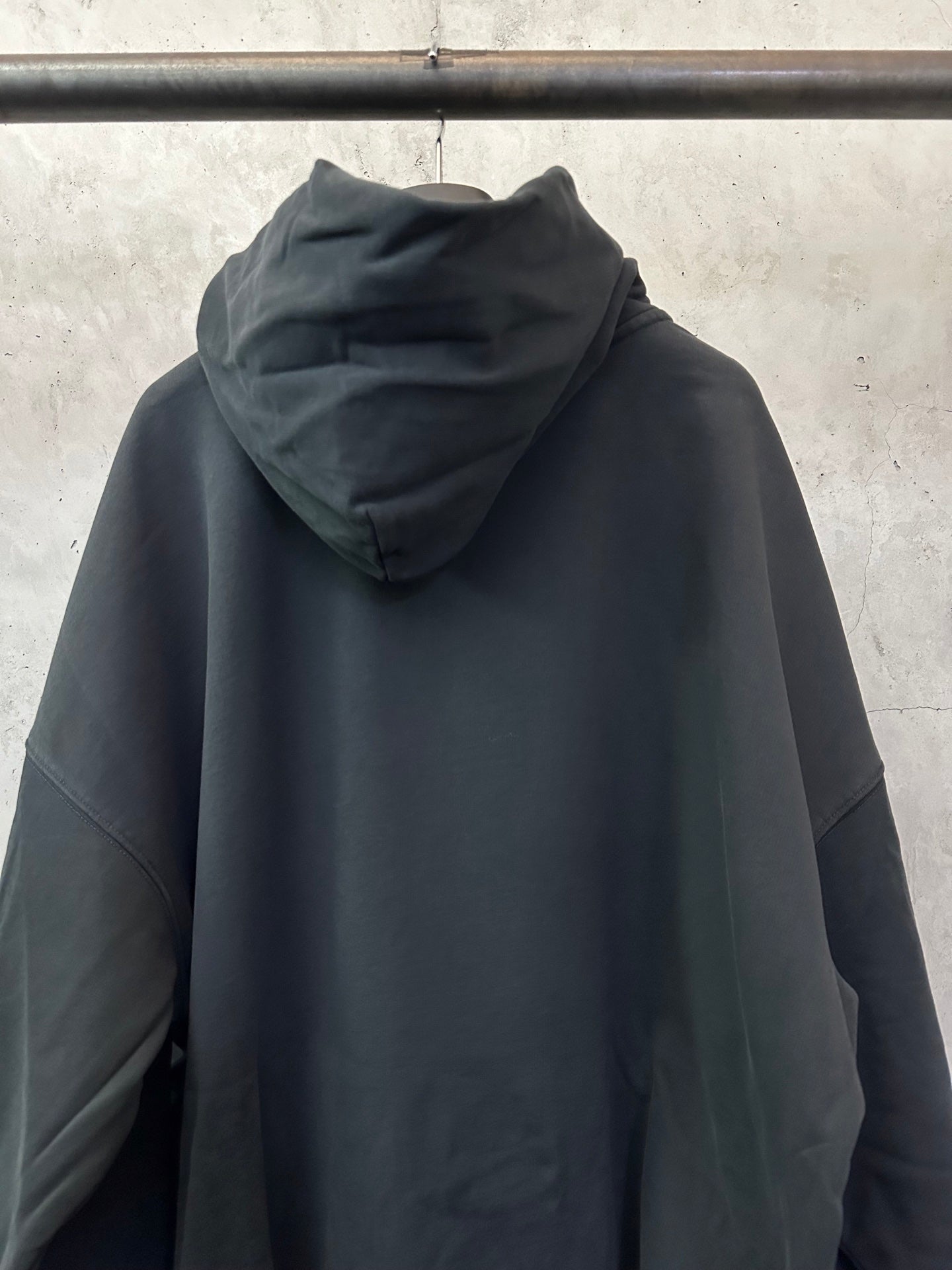 Balenciaga dark hoodie with draped hood, neckline and shoulder detail