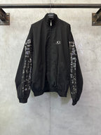 Balenciaga long black bomber jacket, high collar, front zip, logo patch, printed sleeve panels