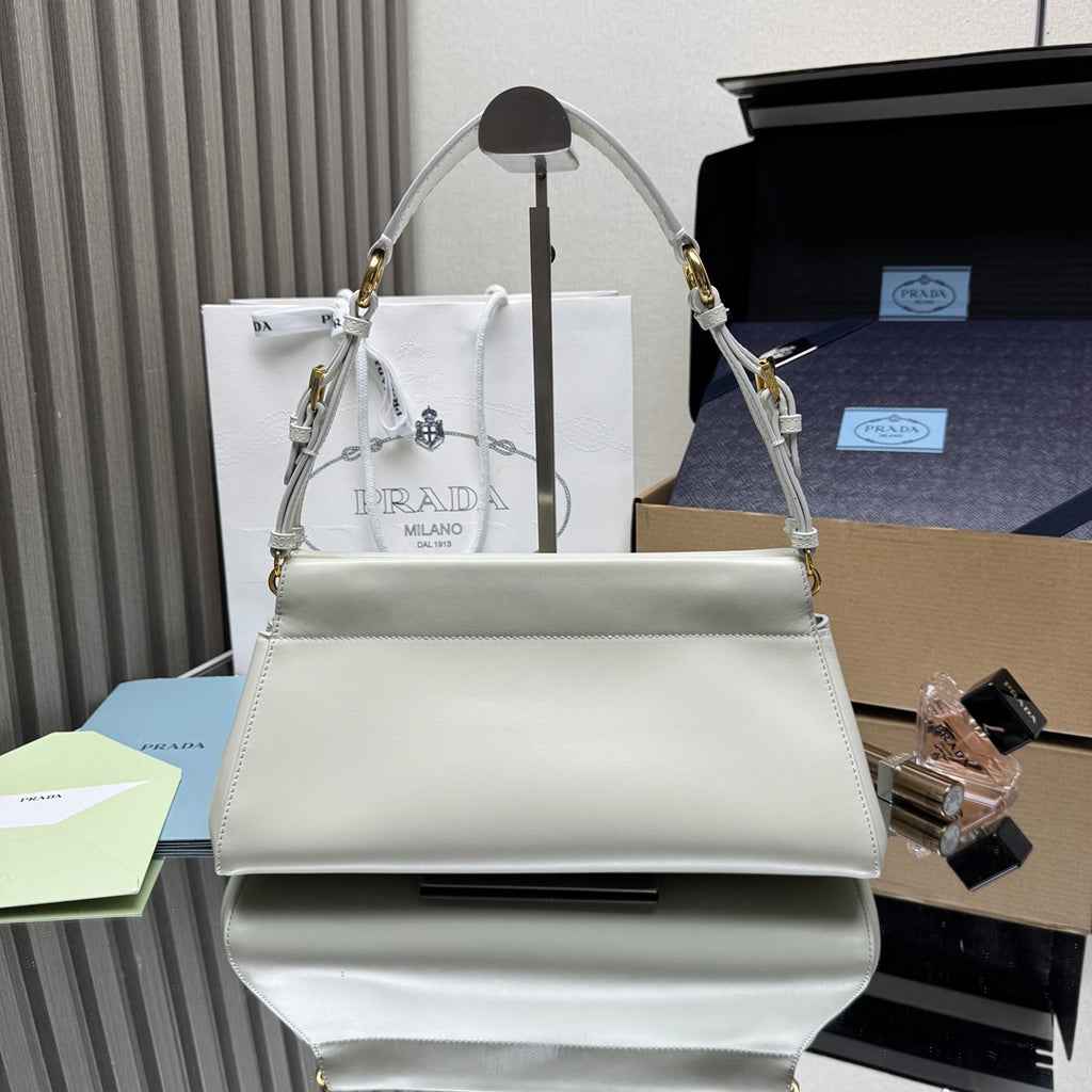 Prada white leather handbag with curved top handle and gold-tone hardware