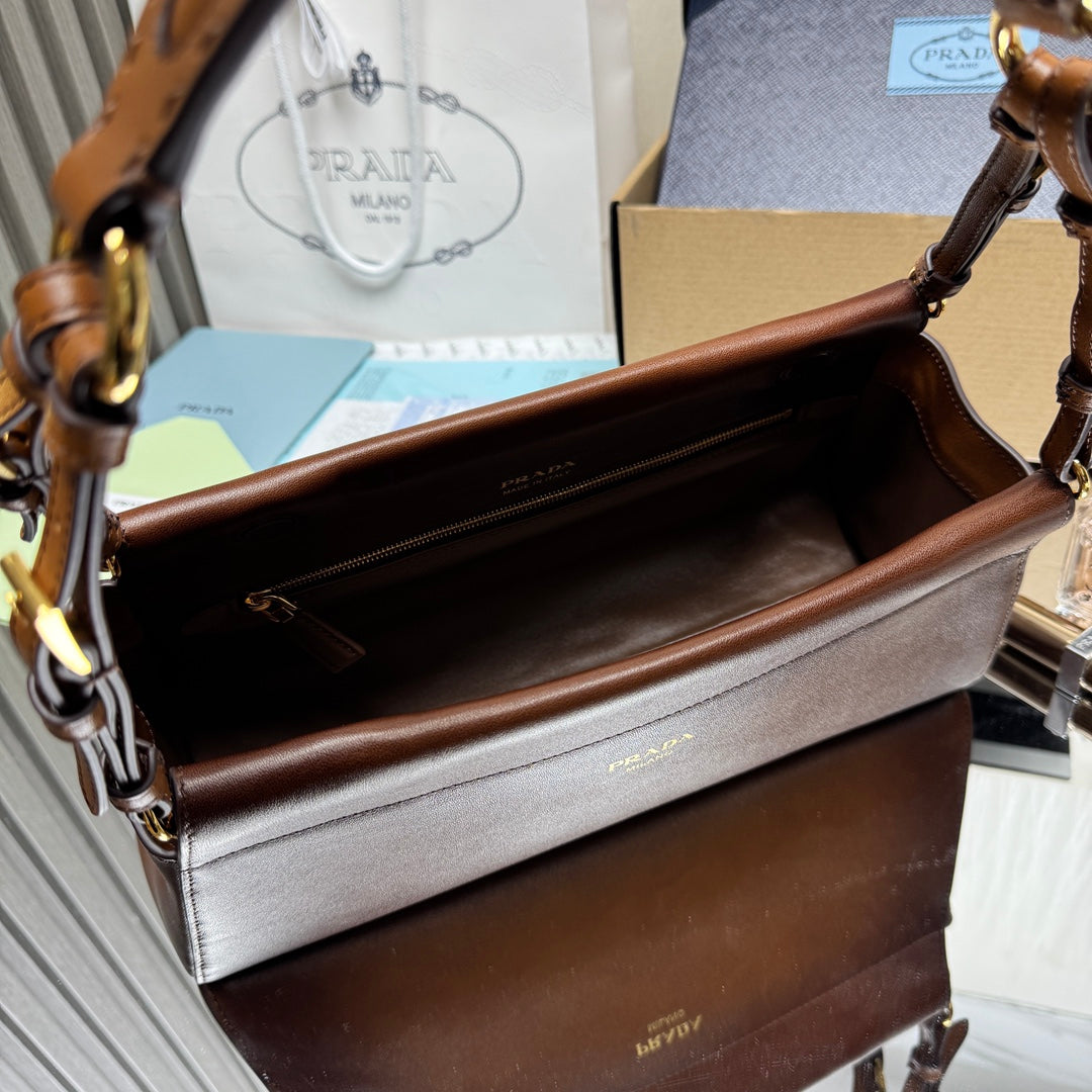 Prada brown leather handbag interior with zipper pocket and stitched trim