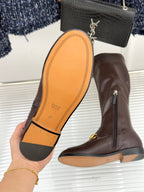 Gucci ladies knee-high boot sole and side view in dark brown leather with gold trim